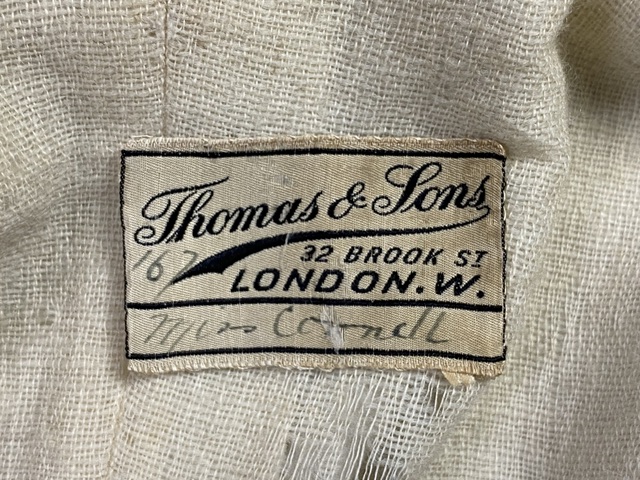 1 antique coat Thomas and sons 1905