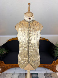 Cream silk embroidered Georgian waistcoat c.1770 from England with long‑line silhouette and floral detailing.