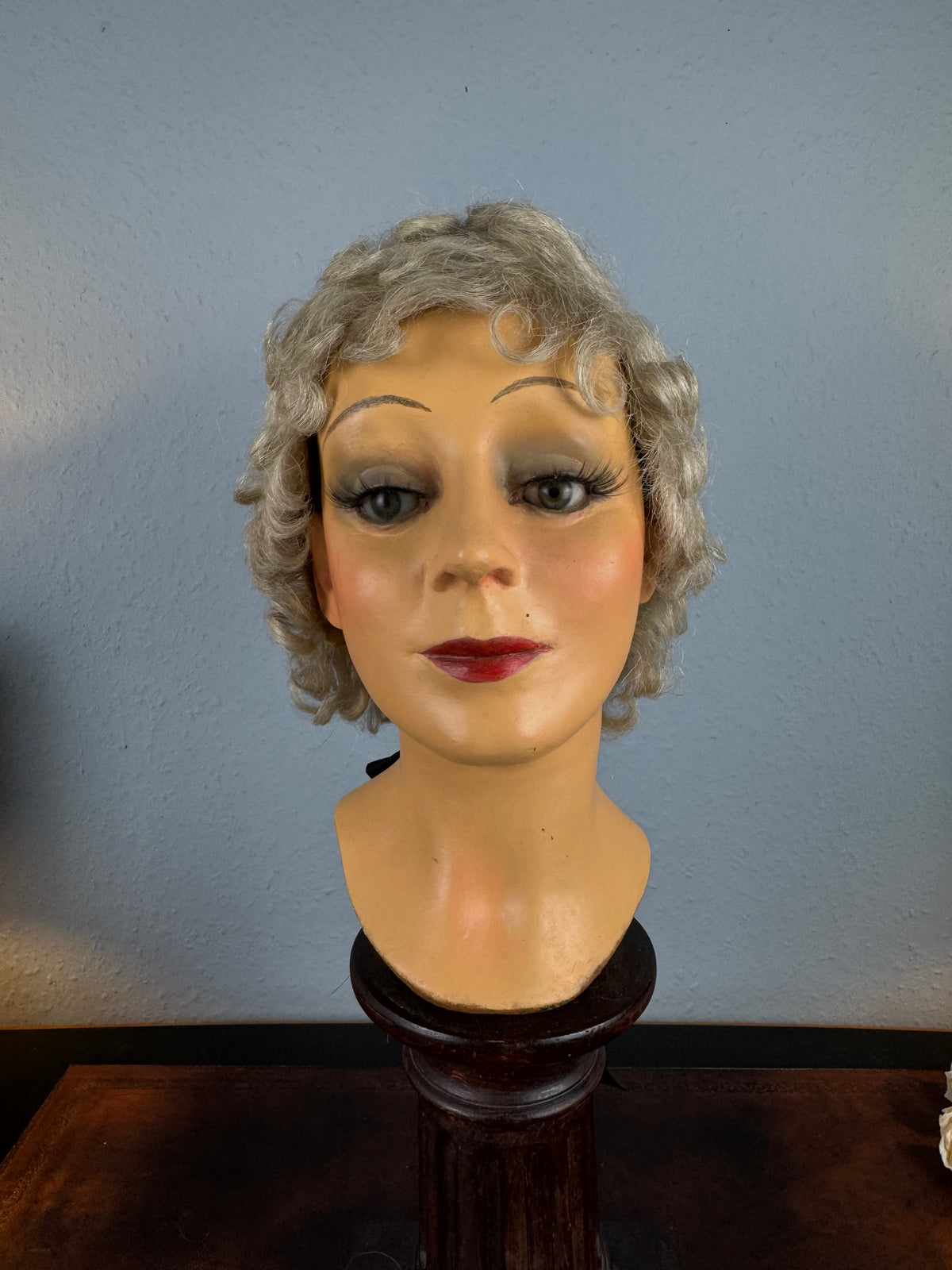Antique theatrical wig c.1890 made of horsehair with black silk bow from Clarkson’s Wellington Street workshop