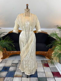 „Antique 1912 cream silk brocade evening dress with lace, crepe drapes and Lady Gillman provenance“