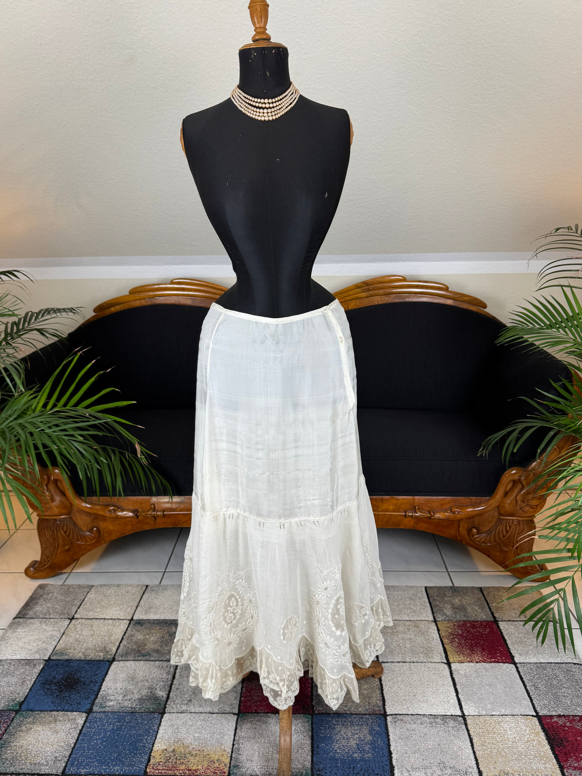 Antique Edwardian petticoat from Lady Gillman's 1911 bridal trousseau with silk waist, whitework embroidery, daisy motifs, and lace flounces