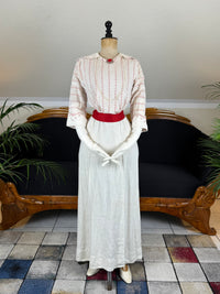 Natural Fiber Daywear Set — Linen skirt, red‑pattern cotton blouse with sailor collar, white leather shoes, red belt.