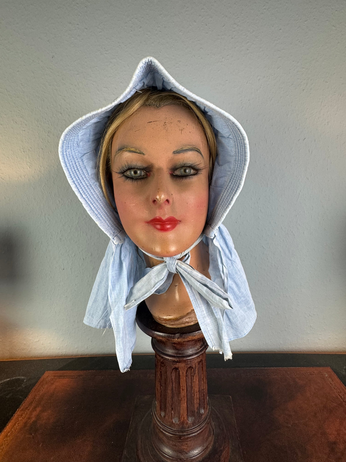 Victorian light‑blue sunbonnet, handmade quilted brim, rural workwear