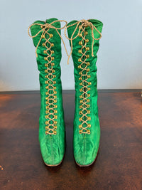 Victorian green silk lace‑up boots, c.1875, with brass fasteners, red leather lining and vivid aniline‑dyed colour