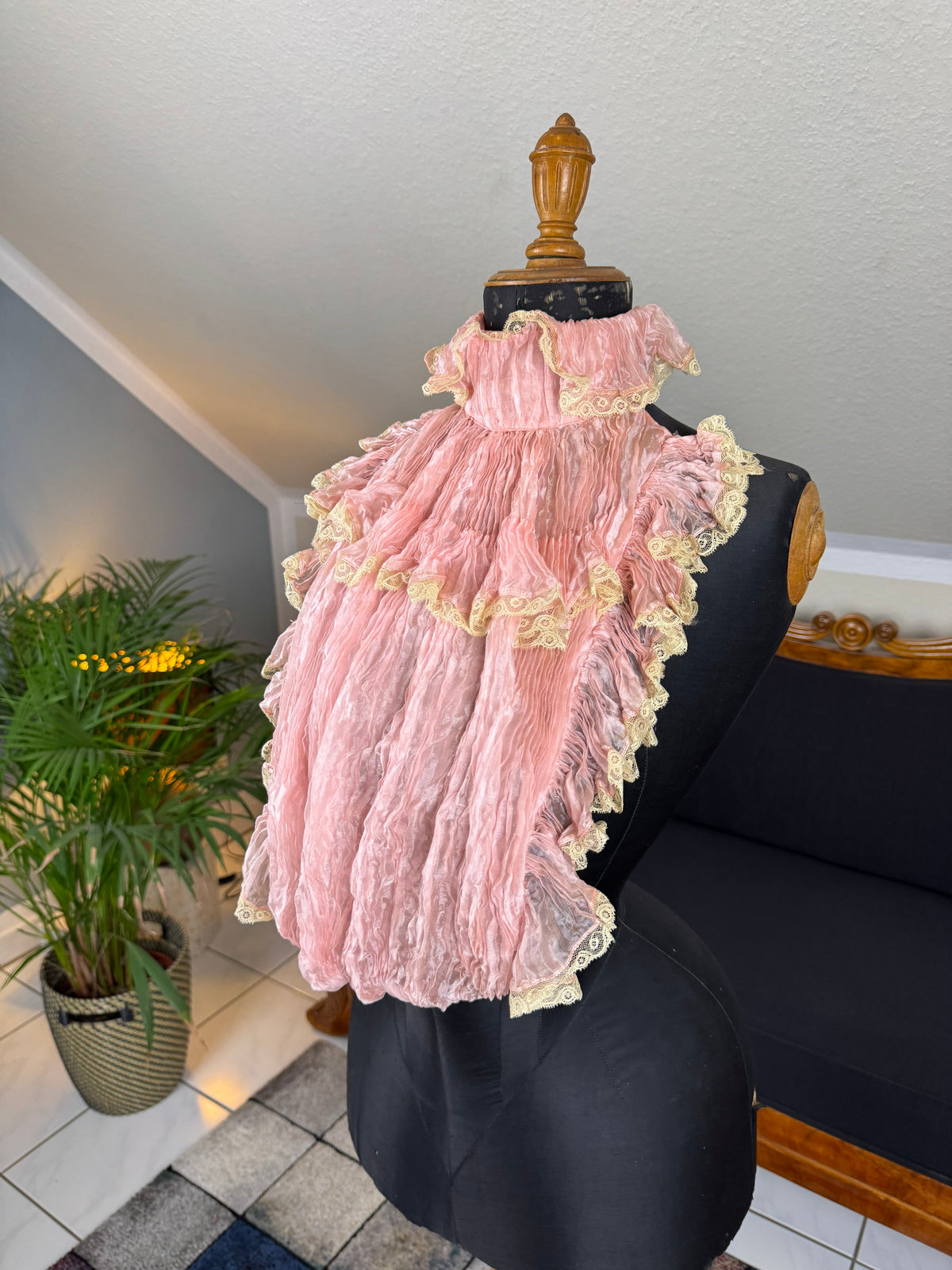 Pink ruffled French bust insert c.1901 with high standing collar and layered Belle Époque frills.