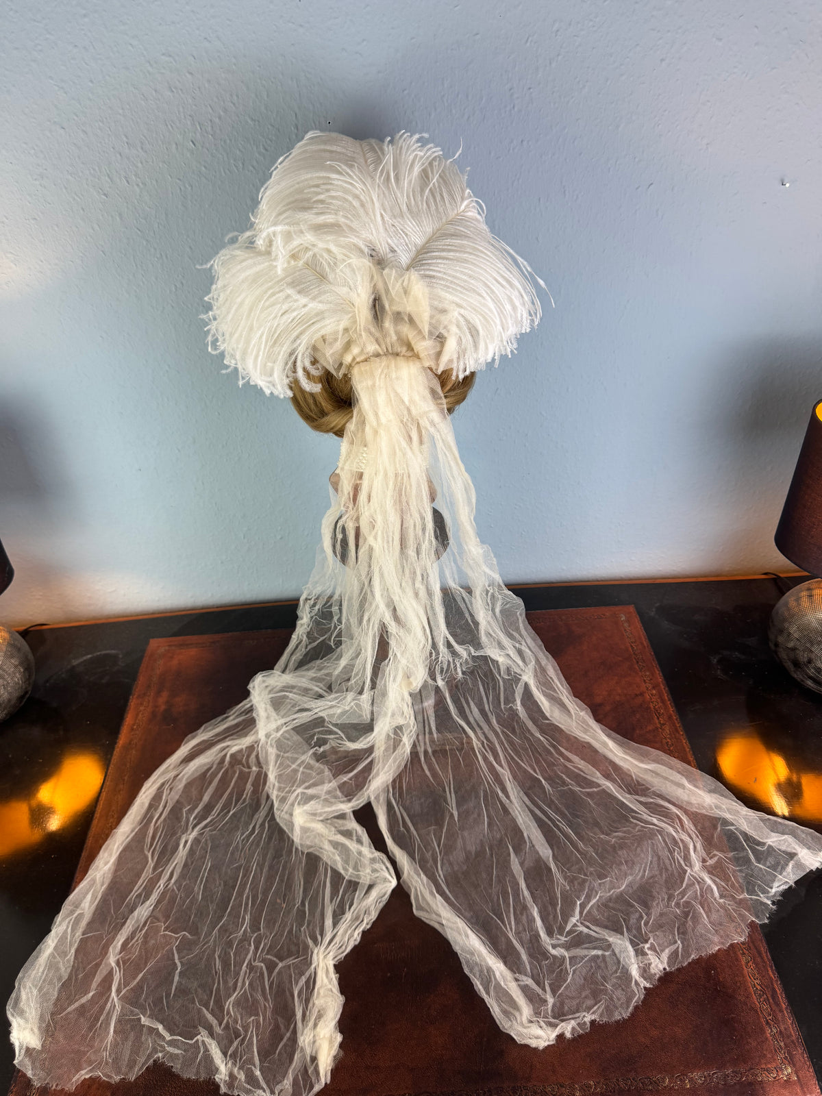 Antique white ostrich feather and tulle hair accessory, late Victorian era.