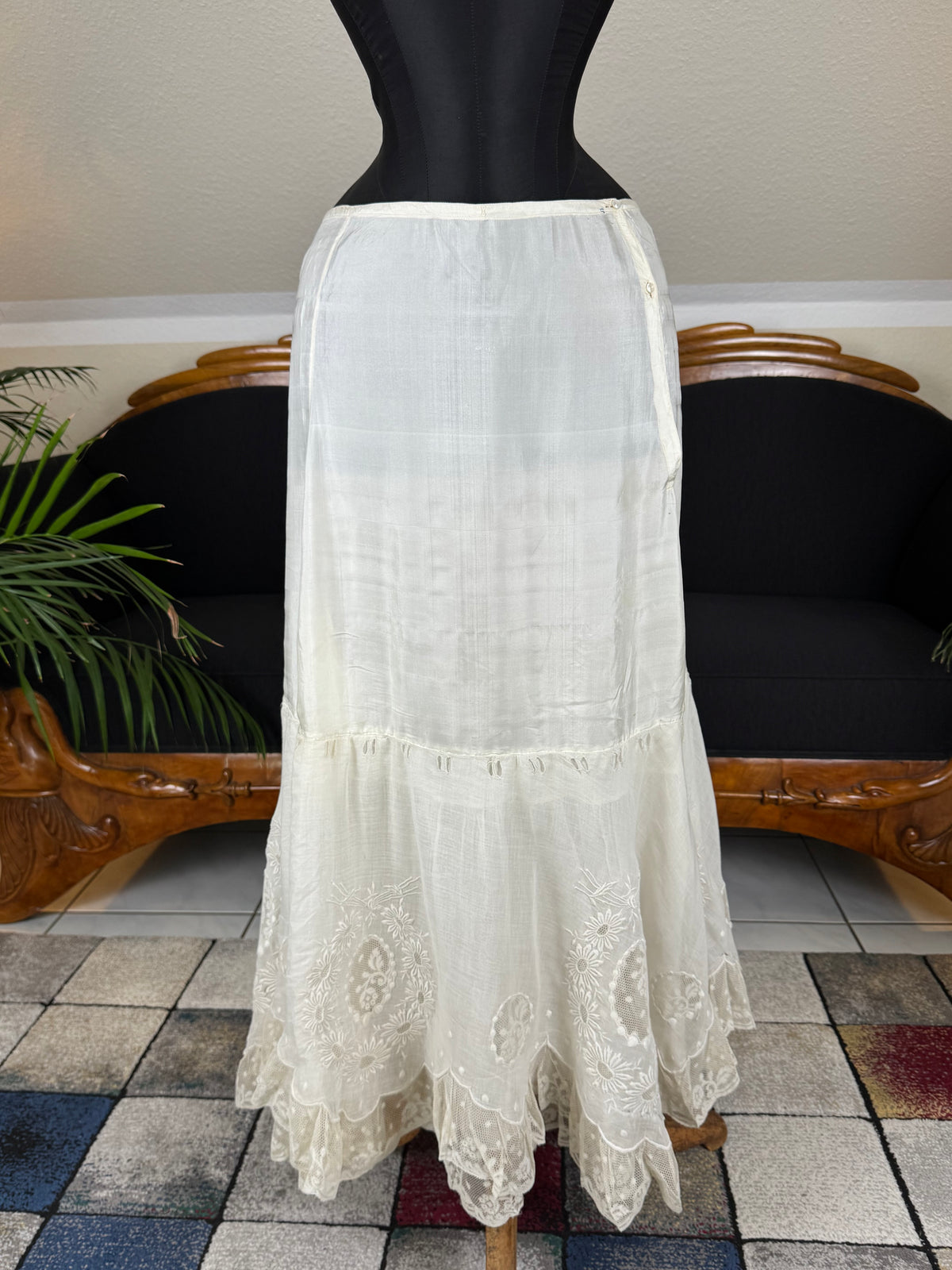 Antique Edwardian petticoat from Lady Gillman's 1911 bridal trousseau with silk waist, whitework embroidery, daisy motifs, and lace flounces