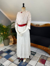 Natural Fiber Daywear Set — Linen skirt, red‑pattern cotton blouse with sailor collar, white leather shoes, red belt.