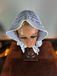 Victorian light‑blue sunbonnet, handmade quilted brim, rural workwear