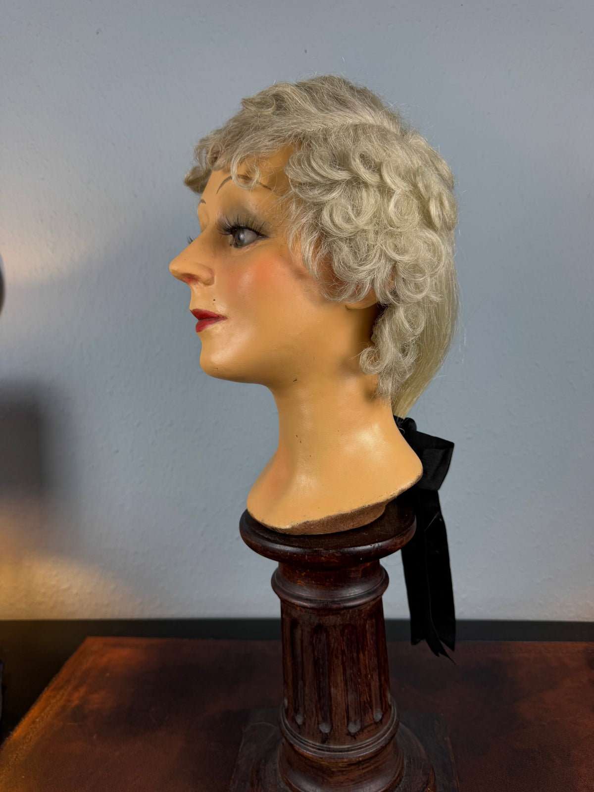 Antique theatrical wig c.1890 made of horsehair with black silk bow from Clarkson’s Wellington Street workshop