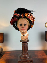 Autumn antique hat with exotic bird decoration, black lace and foliage, early 20th century