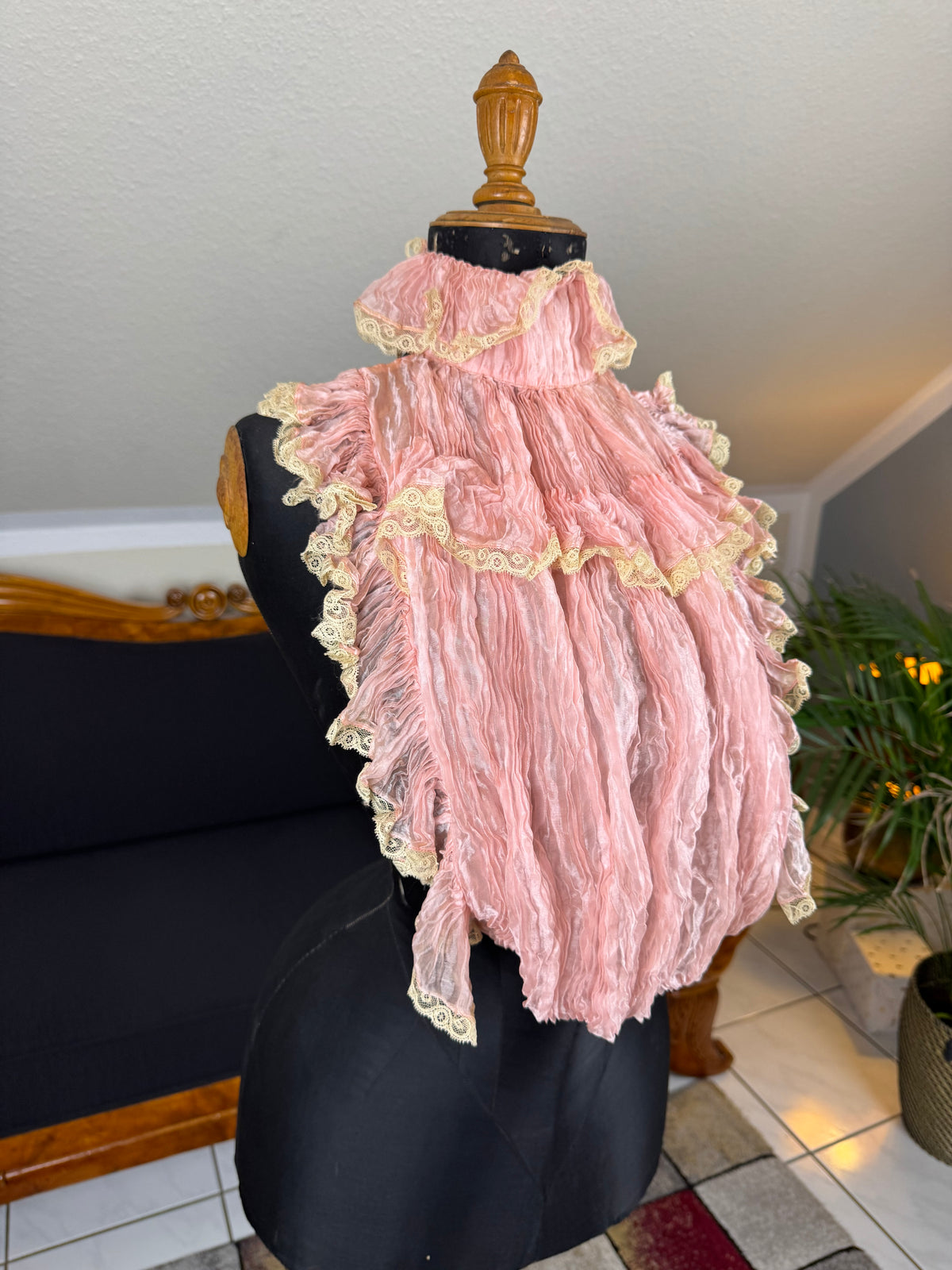 Pink ruffled French bust insert c.1901 with high standing collar and layered Belle Époque frills.