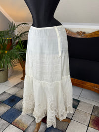 Antique Edwardian petticoat from Lady Gillman's 1911 bridal trousseau with silk waist, whitework embroidery, daisy motifs, and lace flounces