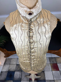 Cream silk embroidered Georgian waistcoat c.1770 from England with long‑line silhouette and floral detailing.
