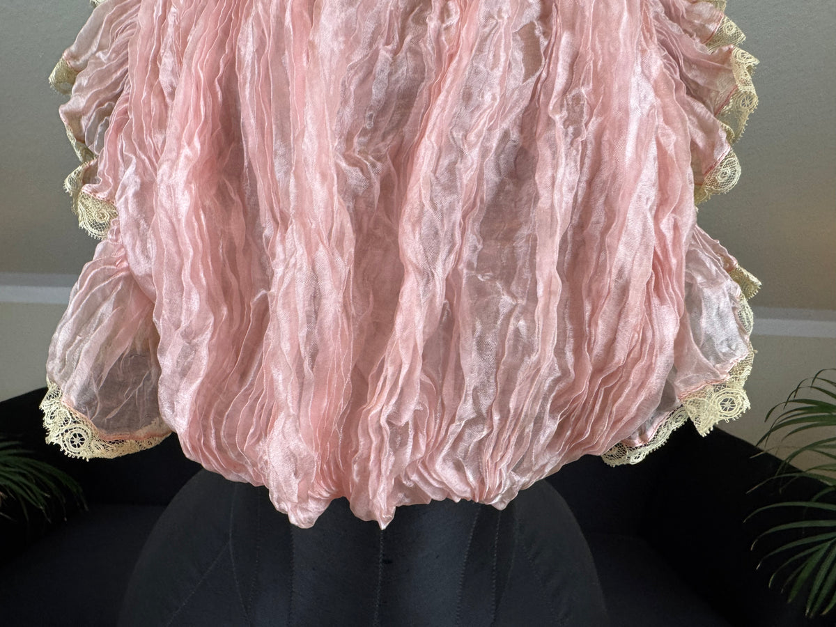 Pink ruffled French bust insert c.1901 with high standing collar and layered Belle Époque frills.