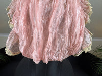 Pink ruffled French bust insert c.1901 with high standing collar and layered Belle Époque frills.