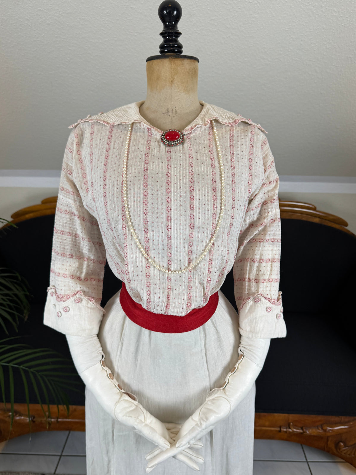 Natural Fiber Daywear Set — Linen skirt, red‑pattern cotton blouse with sailor collar, white leather shoes, red belt.