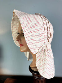 Antique Victorian printed cotton sunbonnet with wide quilted brim, ca. 1900