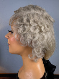 Antique theatrical wig c.1890 made of horsehair with black silk bow from Clarkson’s Wellington Street workshop