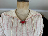 Natural Fiber Daywear Set — Linen skirt, red‑pattern cotton blouse with sailor collar, white leather shoes, red belt.