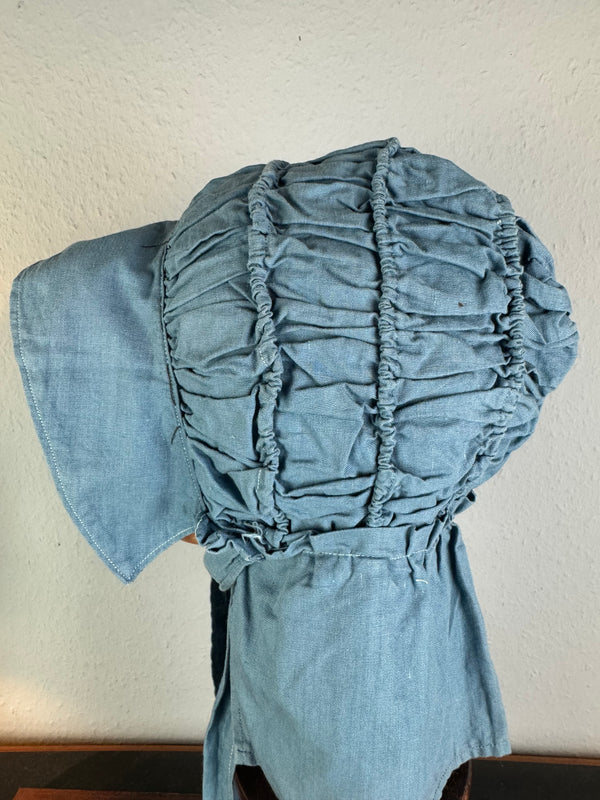 Antique Victorian blue cotton sunbonnet, ca. 1900, ruched brim.