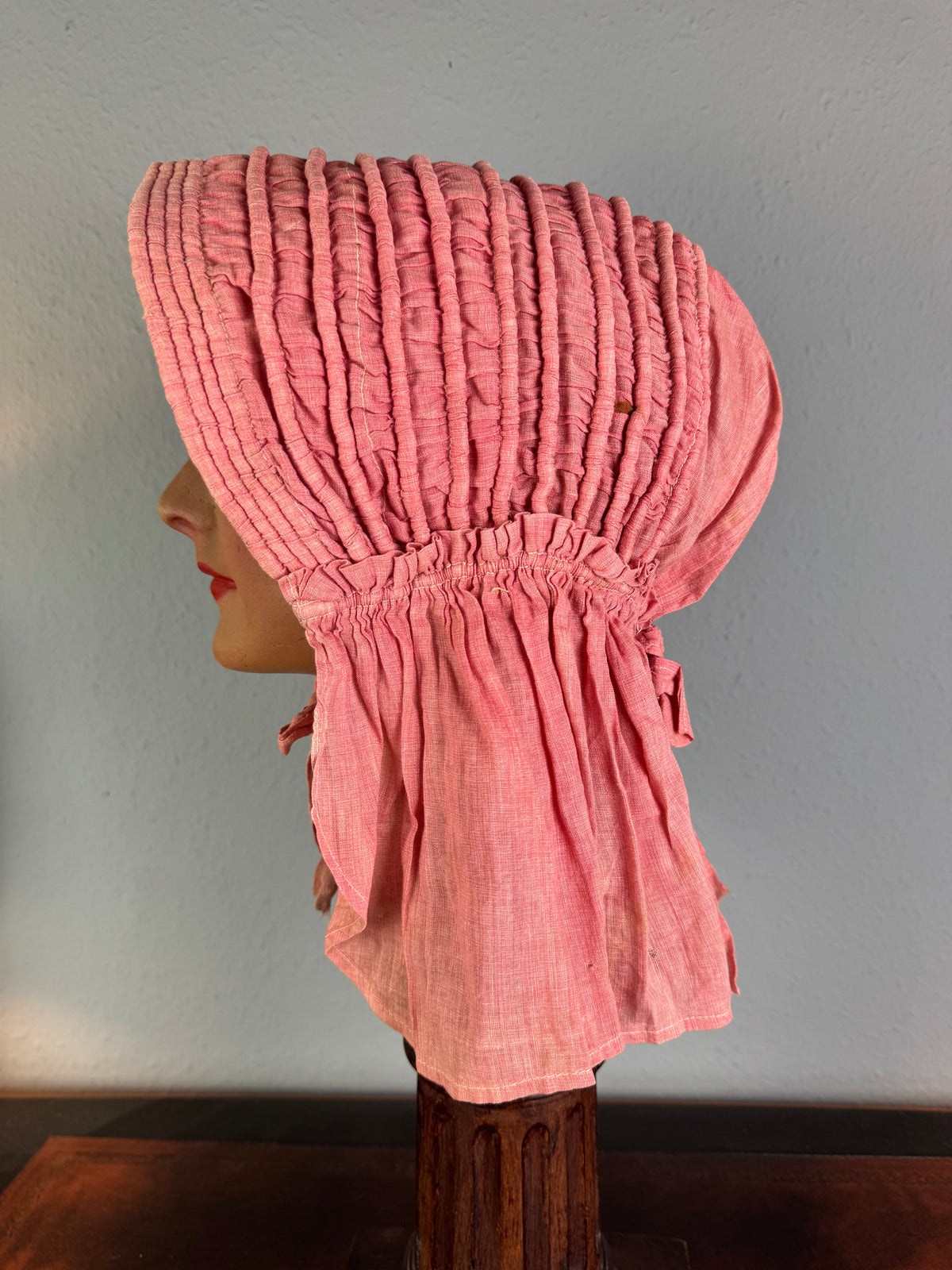 Antique Victorian pink quilted sunbonnet with small shield brim, ca. 1900