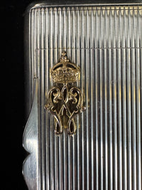 Silver cigarette case of Crown Prince Wilhelm of Prussia with crowned monogram, presentation pin and original caricature in bespoke casket.