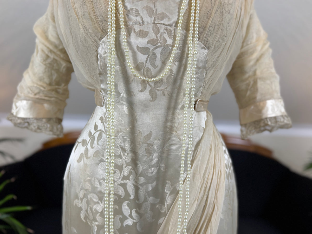Evening Dress 1912 – Cream Silk Brocade with Lace & Crepe Drapes by M. E. Humble, Court Dressmaker, Lady Gillman Provenance