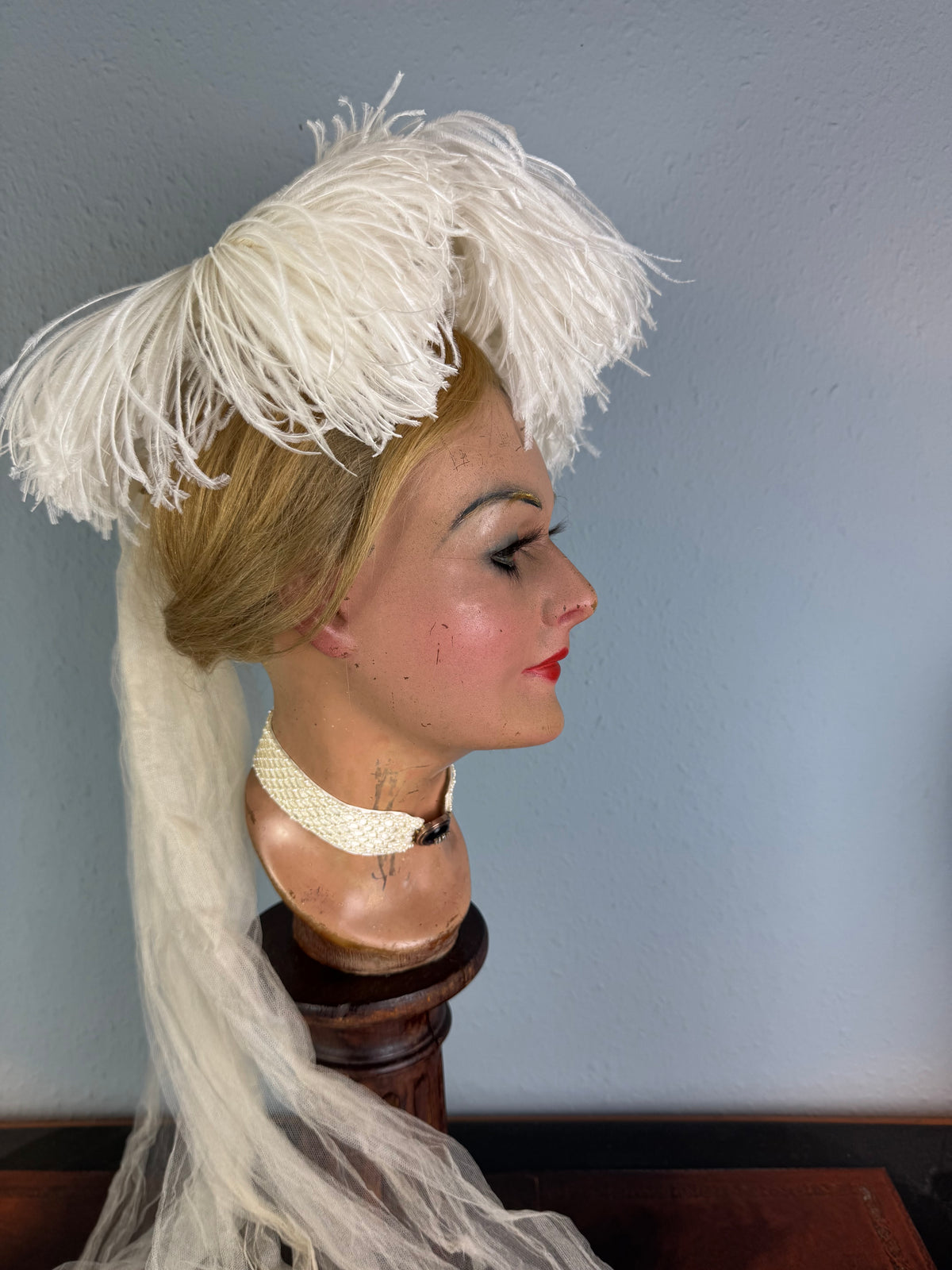 Antique white ostrich feather and tulle hair accessory, late Victorian era.