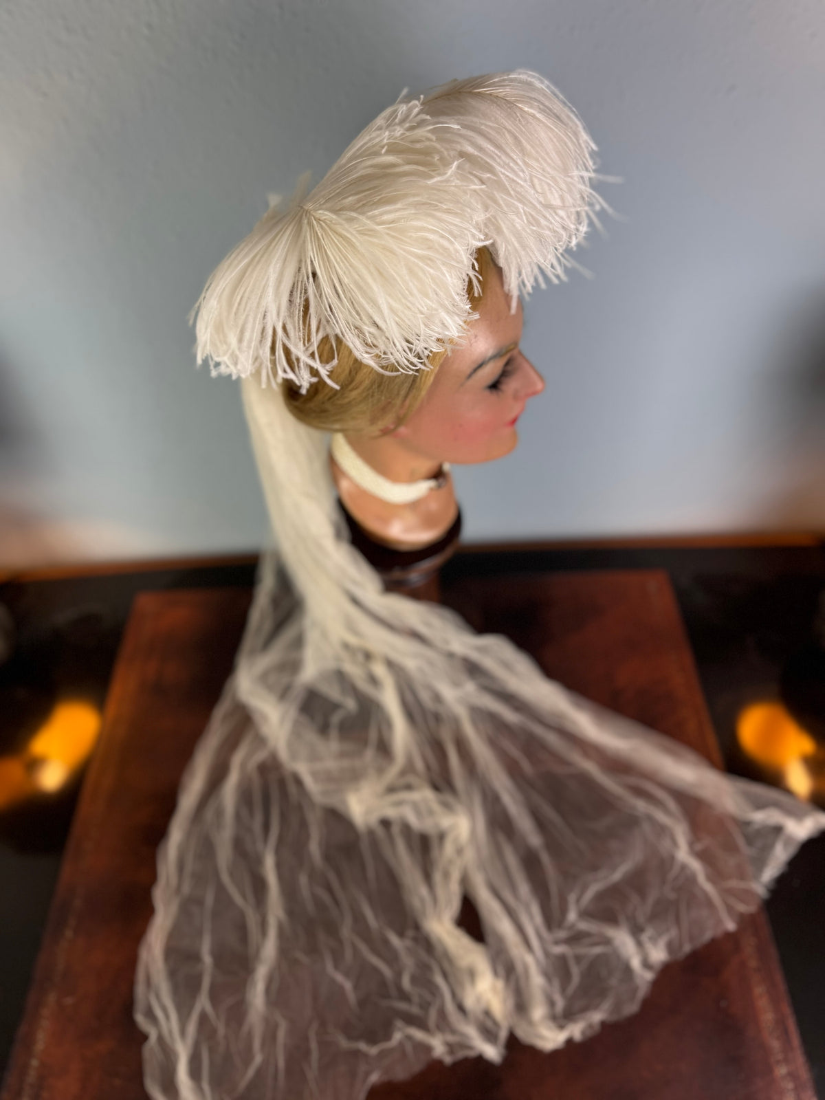 Antique white ostrich feather and tulle hair accessory, late Victorian era.