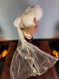 Antique white ostrich feather and tulle hair accessory, late Victorian era.