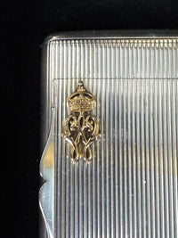 Silver cigarette case of Crown Prince Wilhelm of Prussia with crowned monogram, presentation pin and original caricature in bespoke casket.