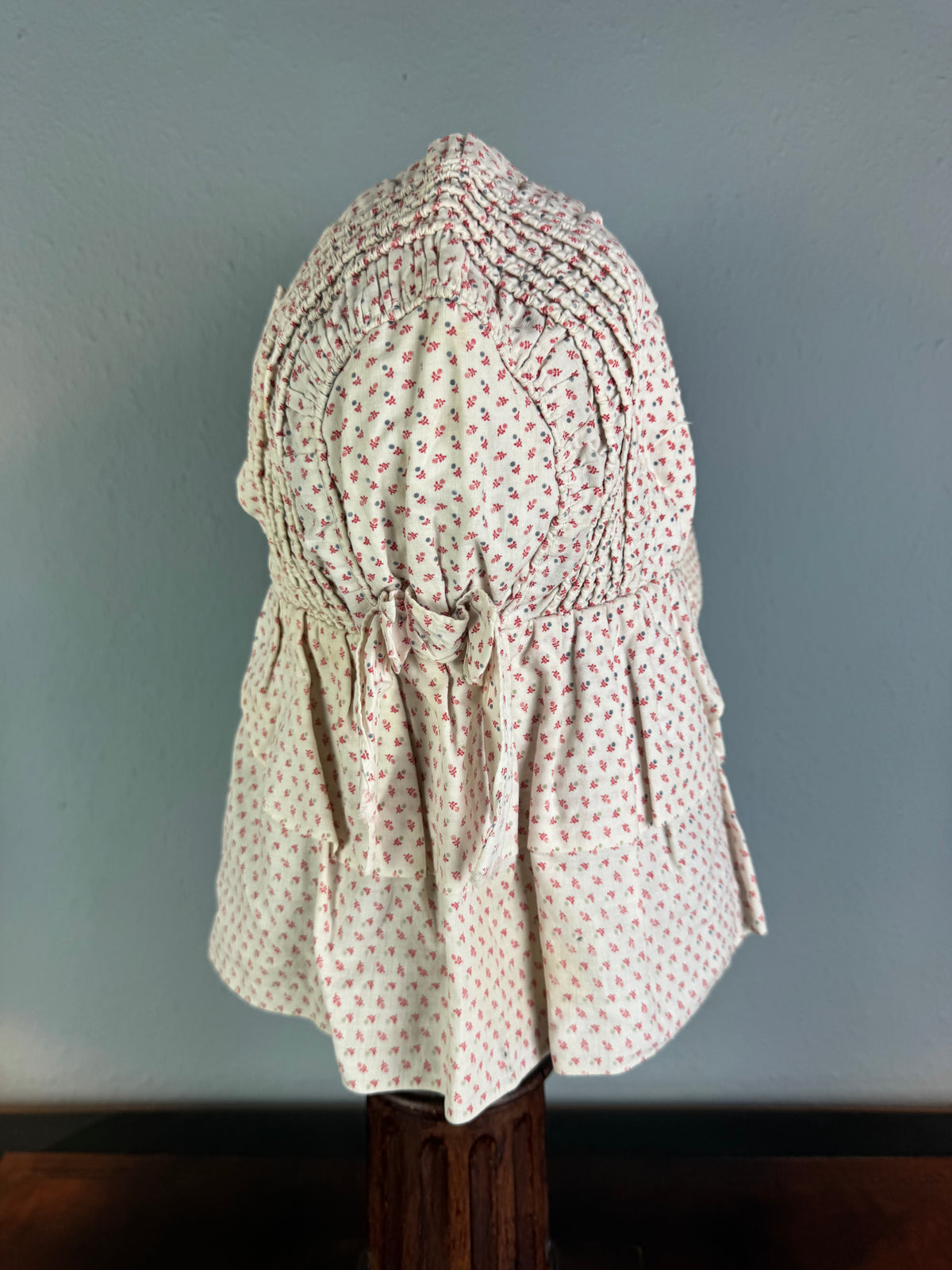 Antique Victorian printed cotton sunbonnet with wide quilted brim, ca. 1900