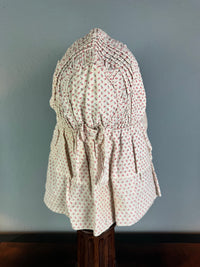 Antique Victorian printed cotton sunbonnet with wide quilted brim, ca. 1900