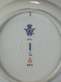 Imperial porcelain Wilhelm II — gold vine‑leaf border and floral decoration close‑up