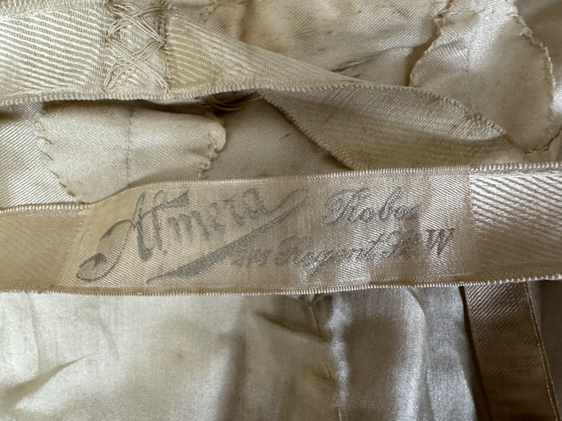 Early 20th‑century Almera Robes London dress with beaded belt, tulle sleeves and long lace train, antique couture gown