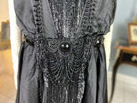 1918 black silk evening dress with sequins, cabochon stones and narrow train, antique transitional gown