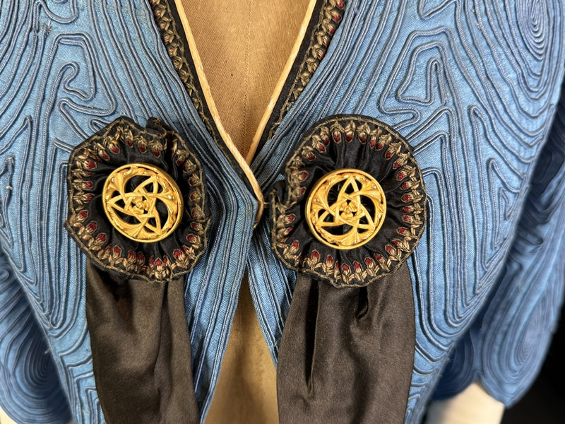 Antique blue linen jacket with soutache appliqués