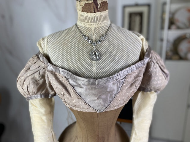1805 white silk Regency Spencer with short sleeves, high waistline and decorative front closure, antique garment