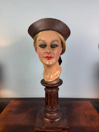 Small French brown straw hat with two back ribbons, sailor‑style shape, well preserved