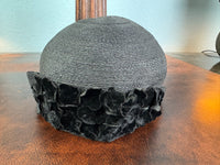 Elegant asymmetrical English 1920s straw hat with velvet appliqués, black silk lining, excellent condition
