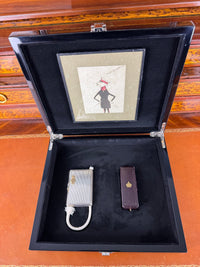Silver cigarette case of Crown Prince Wilhelm of Prussia with crowned monogram, presentation pin and original caricature in bespoke casket.