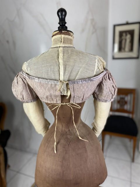 1805 white silk Regency Spencer with short sleeves, high waistline and decorative front closure, antique garment