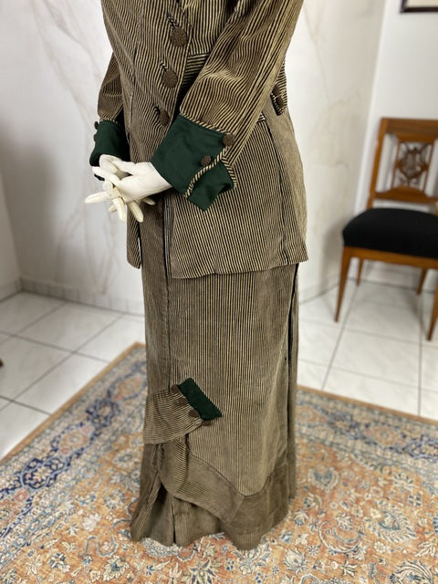 1912 striped Edwardian walking dress in cotton with high waistline, long skirt and decorative buttons, antique gown