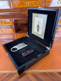 Silver cigarette case of Crown Prince Wilhelm of Prussia with crowned monogram, presentation pin and original caricature in bespoke casket.