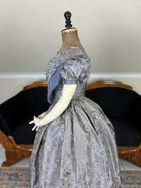 1845 Austrian Biedermeier evening dress in ivory silk with puffed sleeves and fitted bodice, antique gown