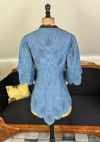 Art Nouveau buttons on early 20th century linen jacket