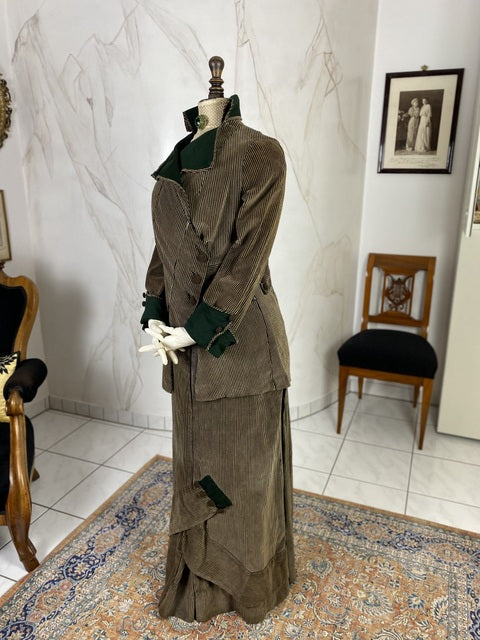 1912 striped Edwardian walking dress in cotton with high waistline, long skirt and decorative buttons, antique gown