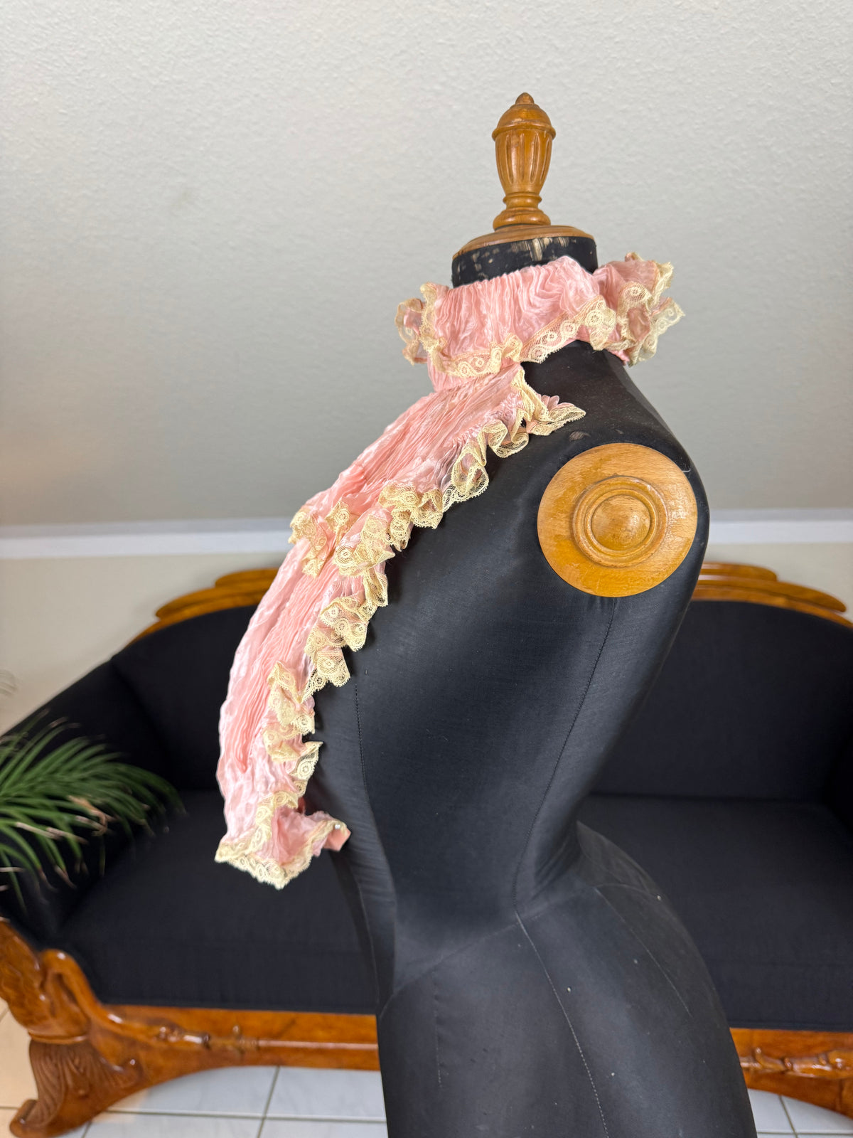 Pink ruffled French bust insert c.1901 with high standing collar and layered Belle Époque frills.