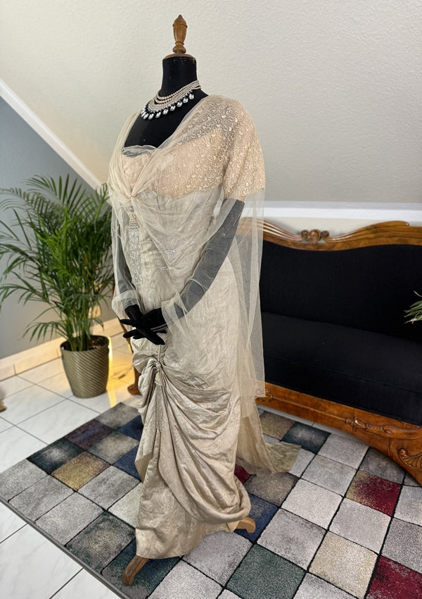 1912 Titanic‑era antique evening dress in ivory silk with lace bodice, draped skirt and rhinestone details, antique gown